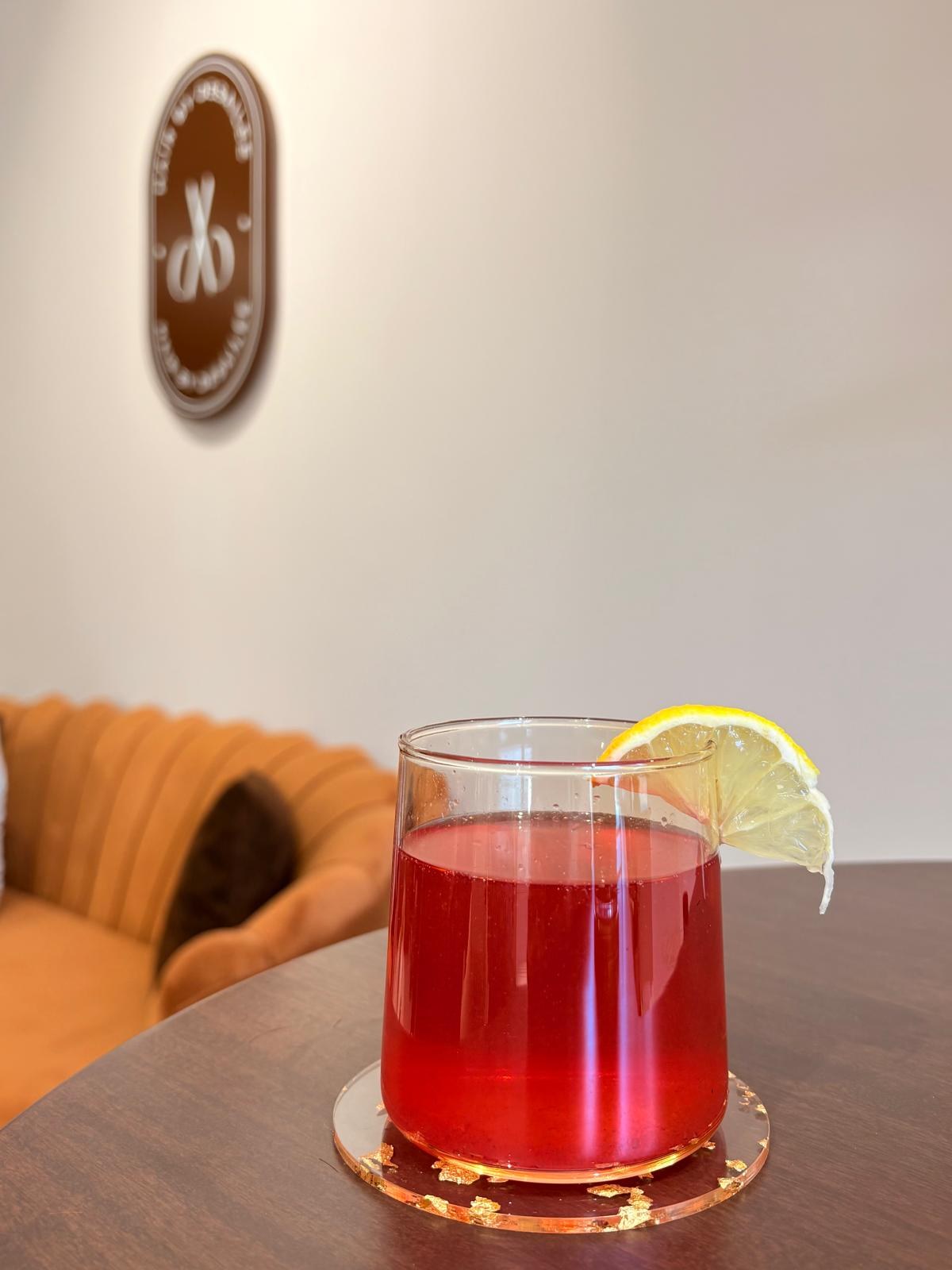 Fresh hibiscus lemonade served at Hair by Desailee