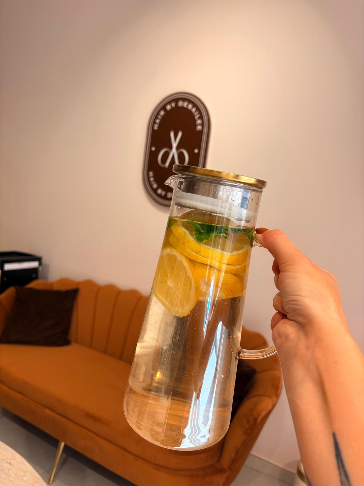 Refreshing lemon and mint infused water at Hair by Desailee
