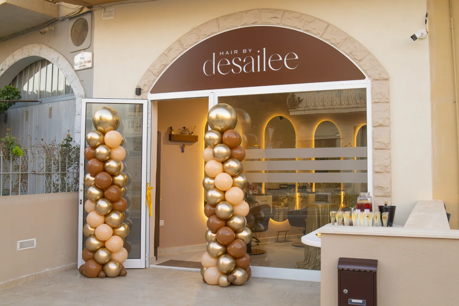 The salon frontage decorated for opening night
