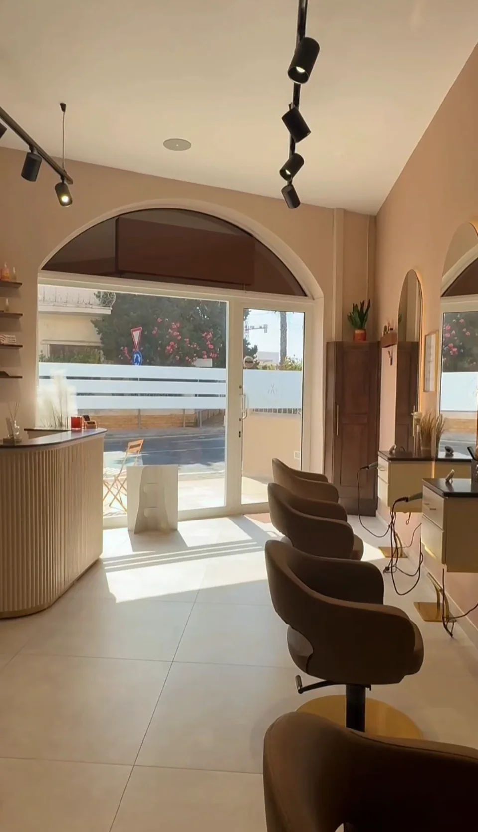 The same arched entrance after the salon transformation