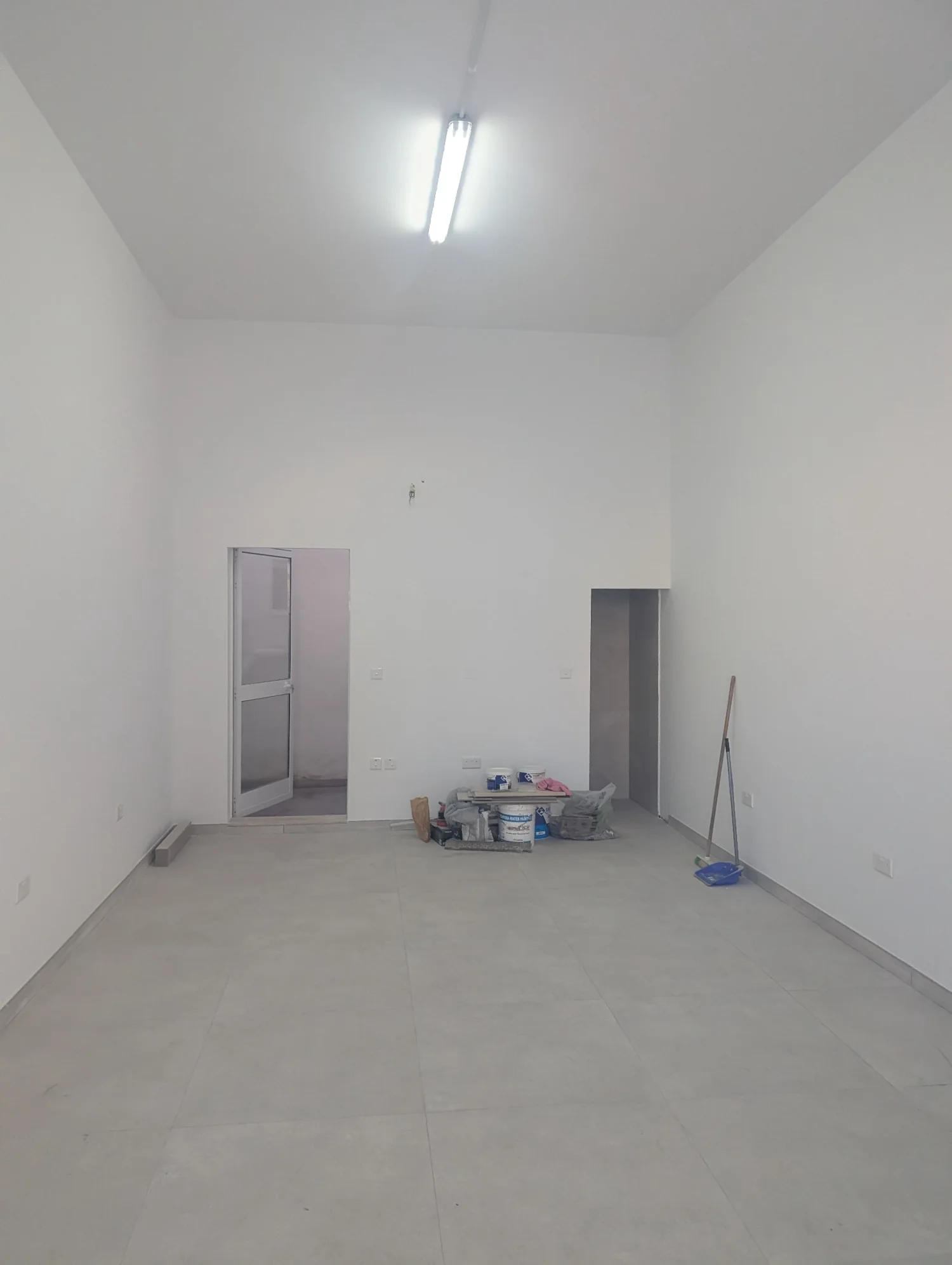 Empty salon before the backwash area was installed