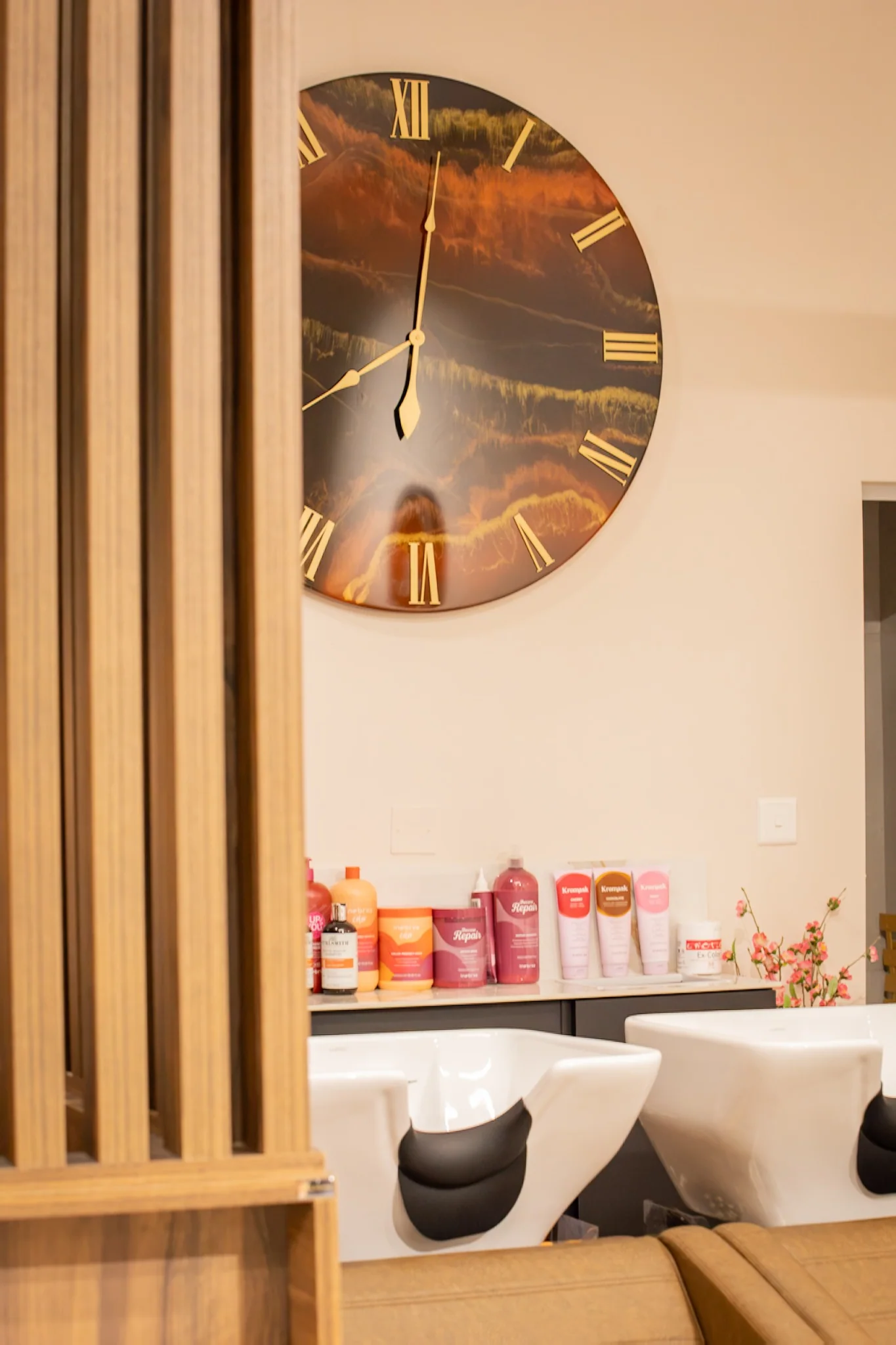 Resin clock and salon products behind the backwash area