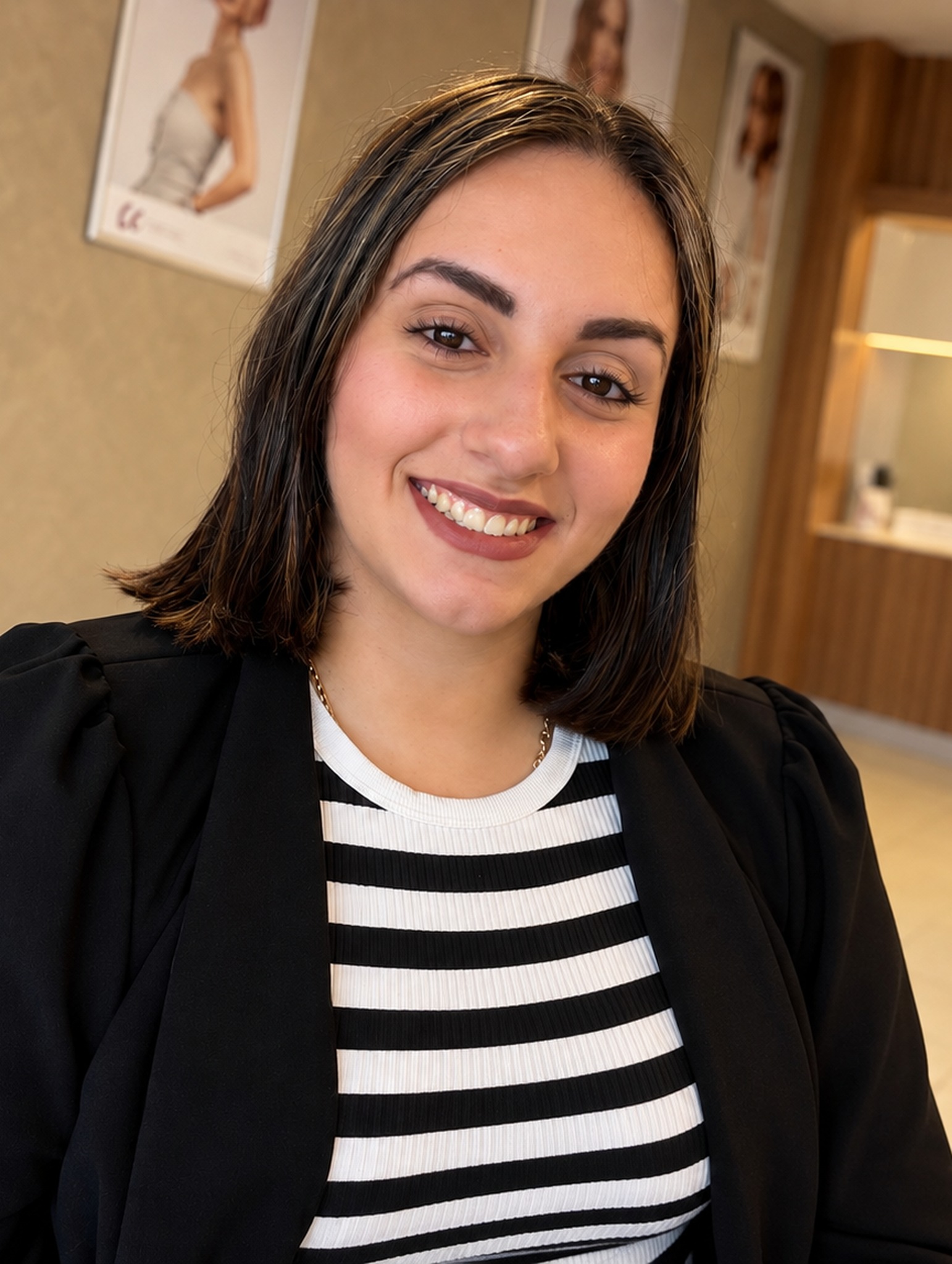 Samira, hairstylist at Hair by Desailee